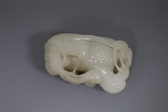 A Chinese white jade group of mandarin ducks, 19th/20th century, L. 4.8cm, wood stand